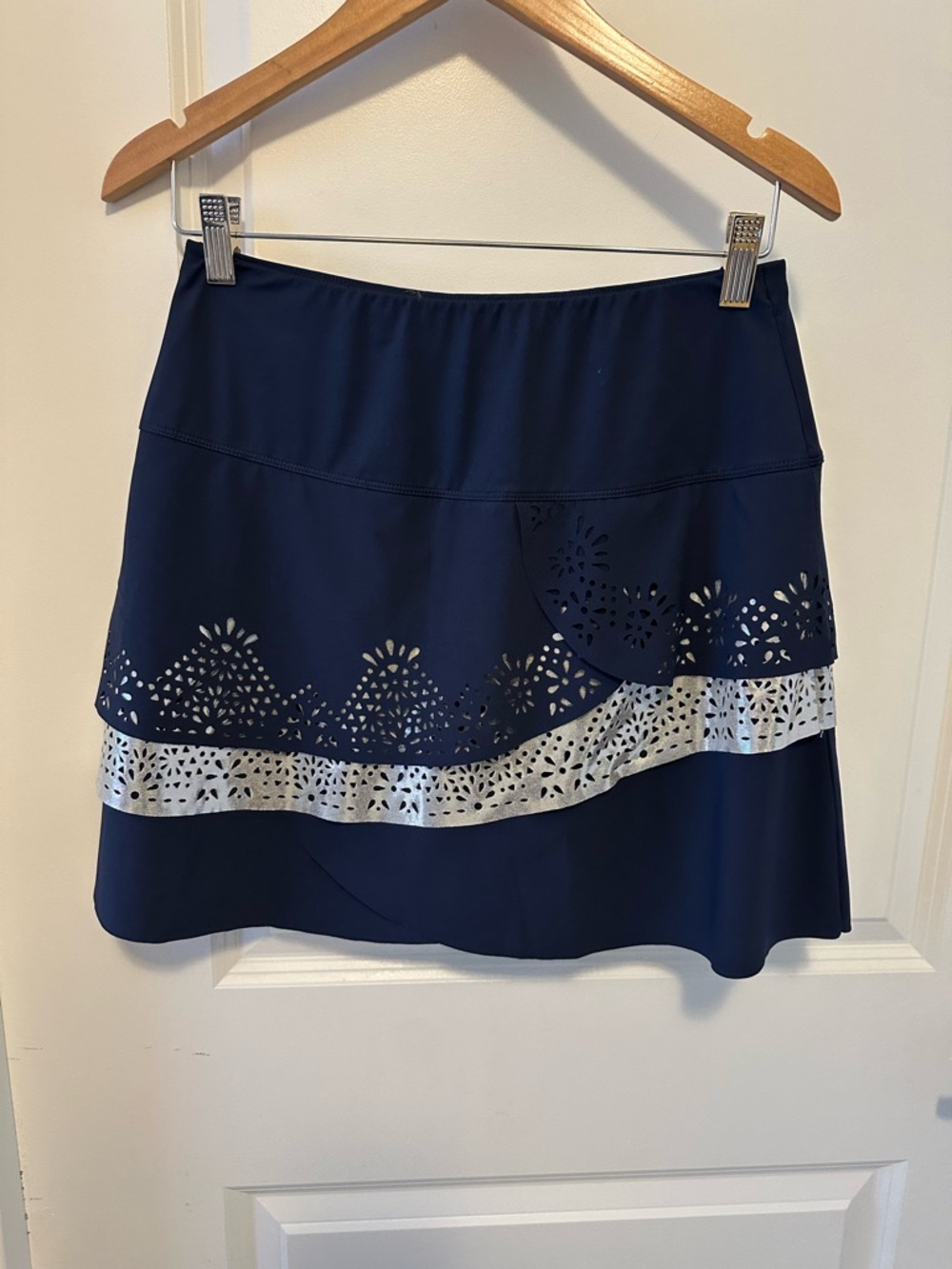 Lucky in Love Navy Skort w silver metallic detail. 17” length, golf